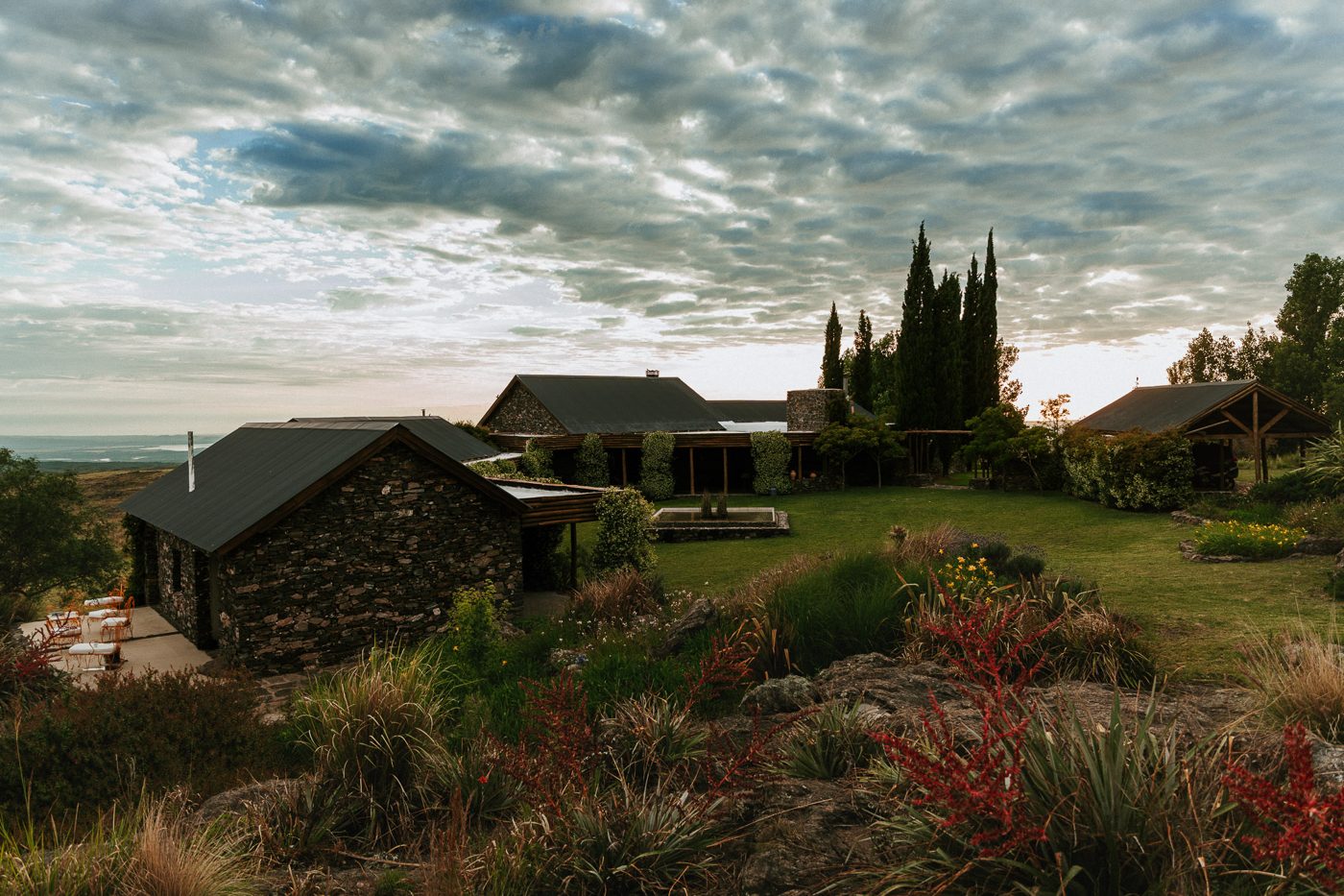 The lodge at sunset, among the cypresses