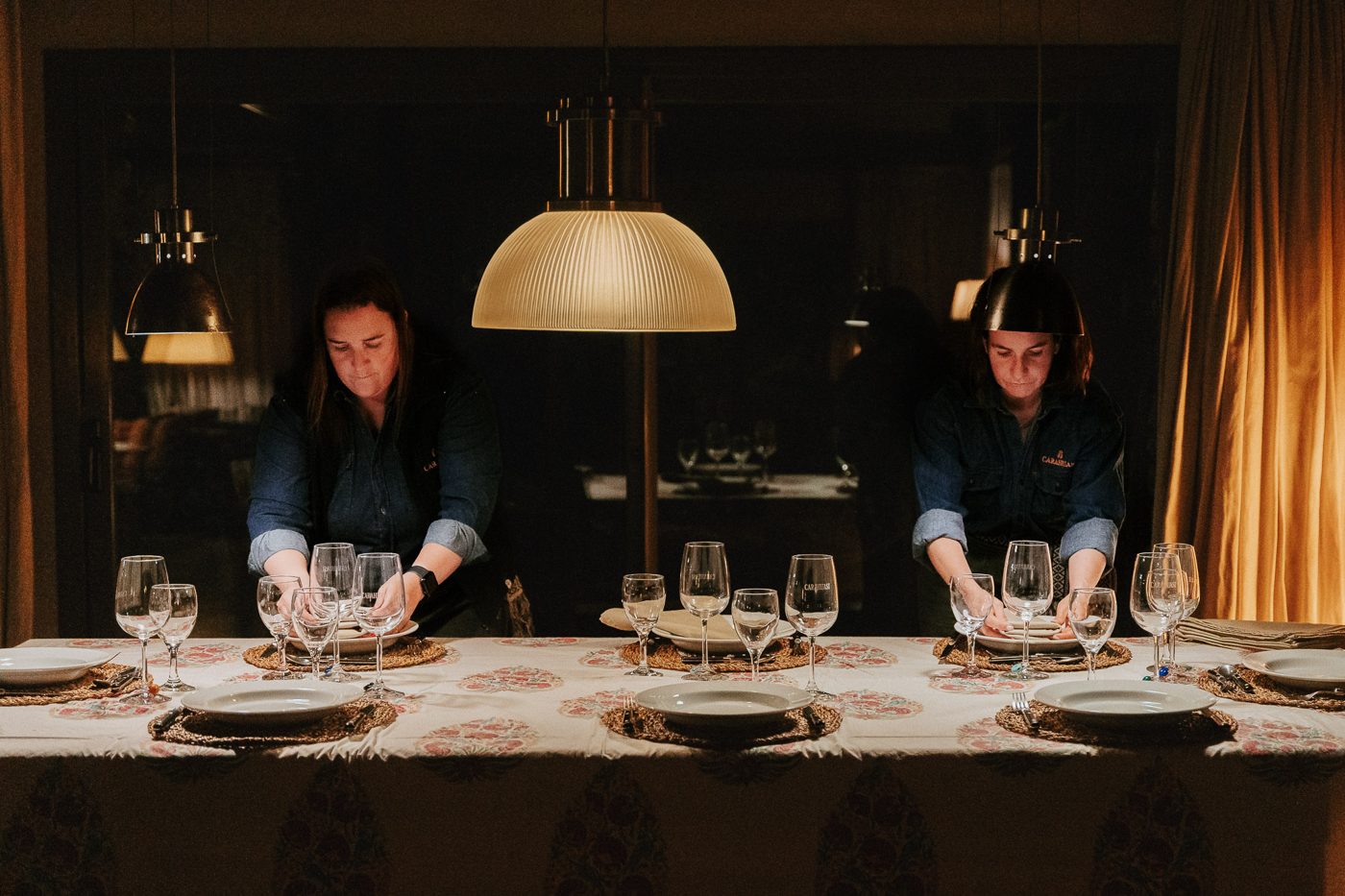 Setting the long table for dinner