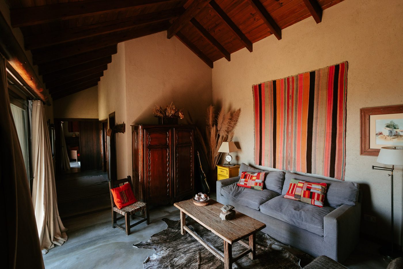 The sitting room, sofa and local textiles