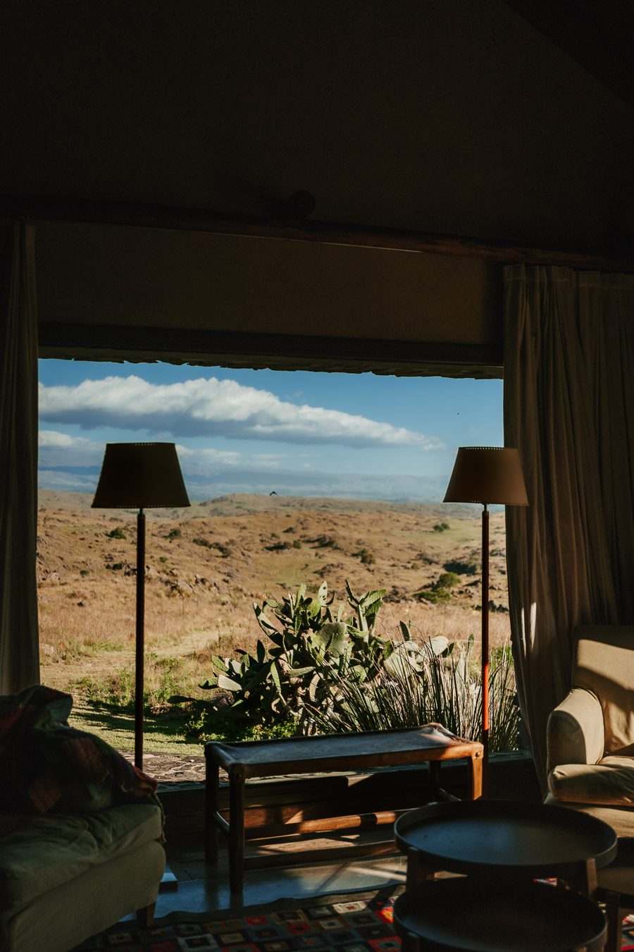 The living room, the hills through the window