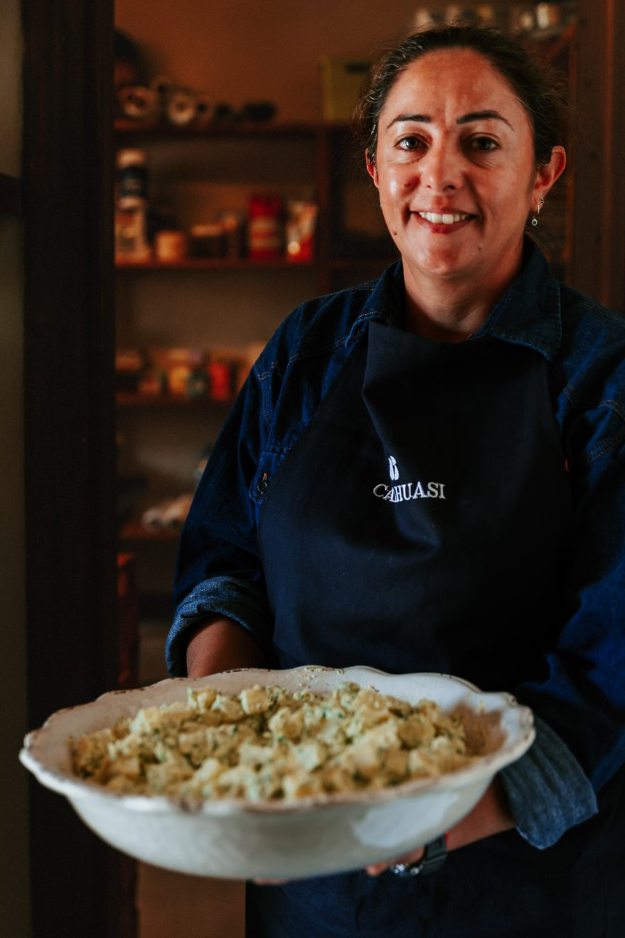 Luciana with a dish fresh from the kitchen