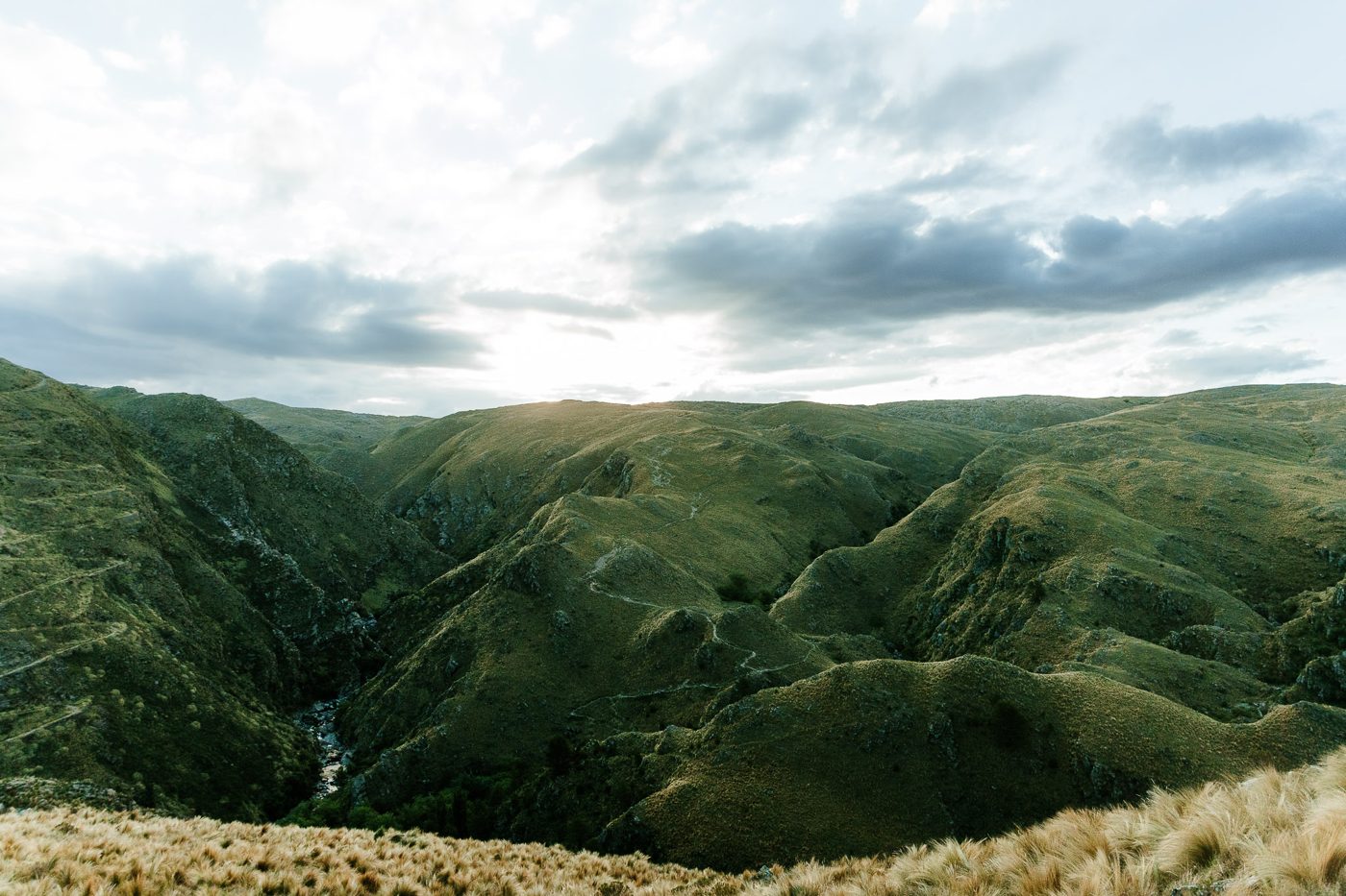 The river canyon between the hills at dusk